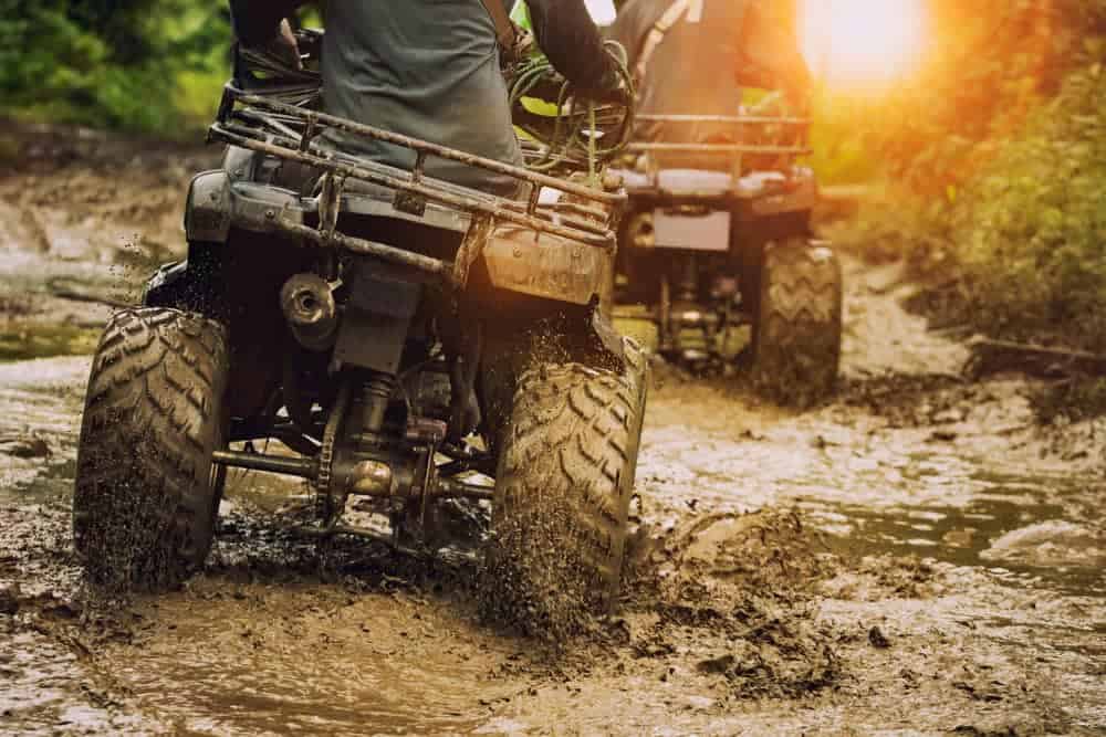 All-terrain vehicles on an off-road track