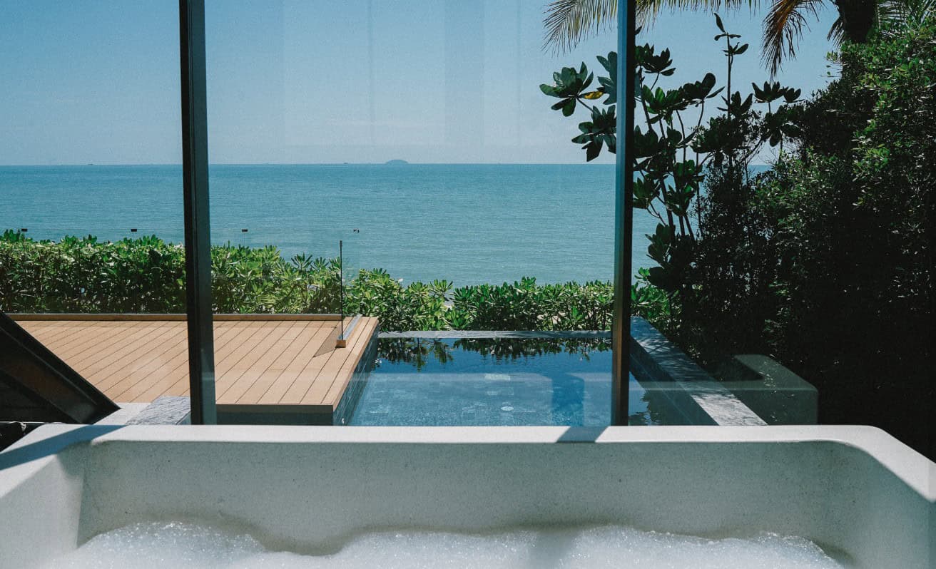 Bubble Bathing with a view of waves crashing on Na Jomtien beach 